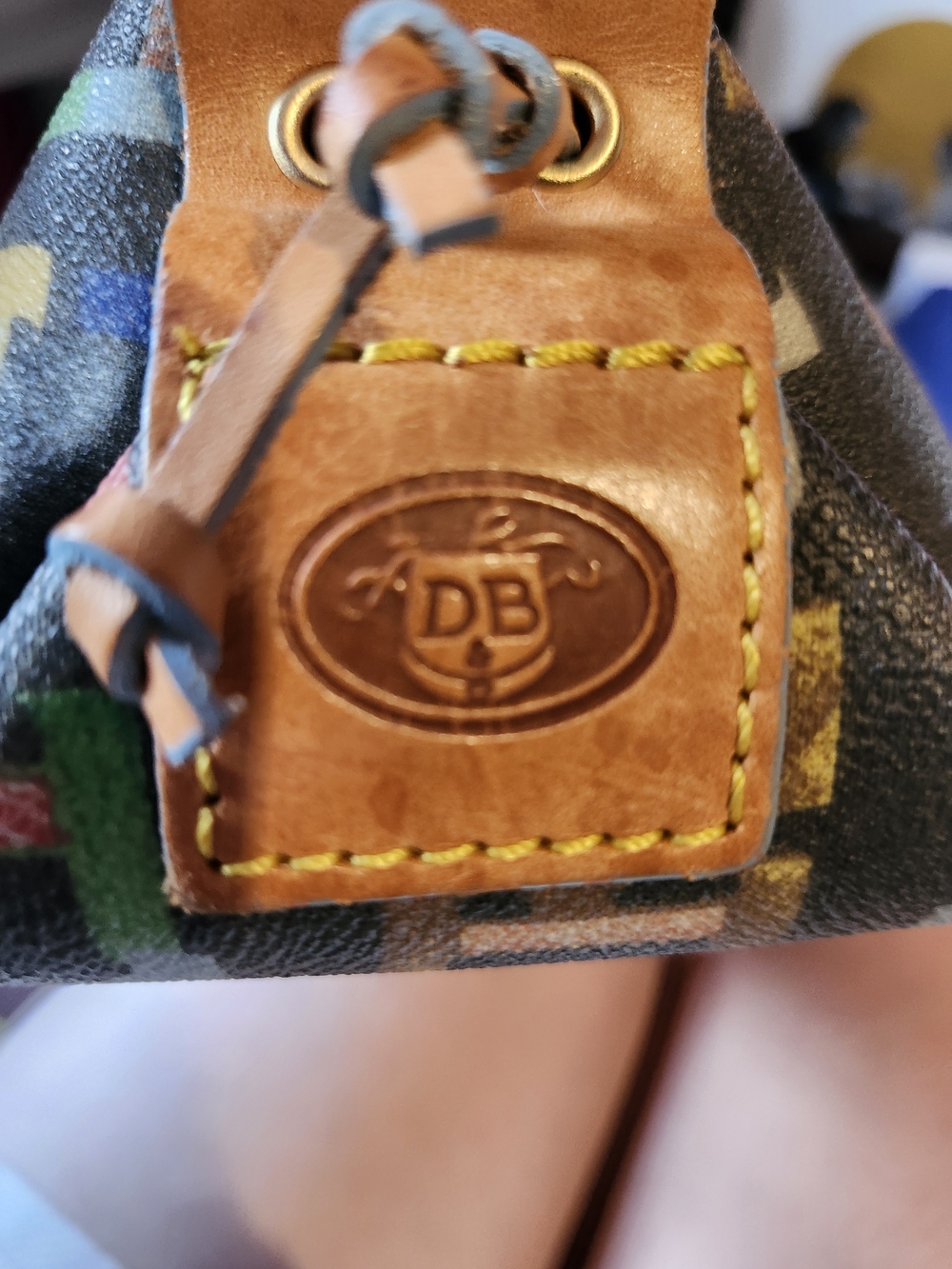 Dooney & Bourke Multicolor Canvas Mini Bucket Bag with Brown Leather Trim